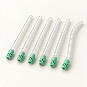 Clear saliva ejectors with green suction tips